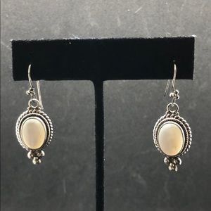 Silver and white stone earrings
